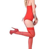 Mimi Cica in red leotard and red knee-high socks, posing with one of her legs up in the air.